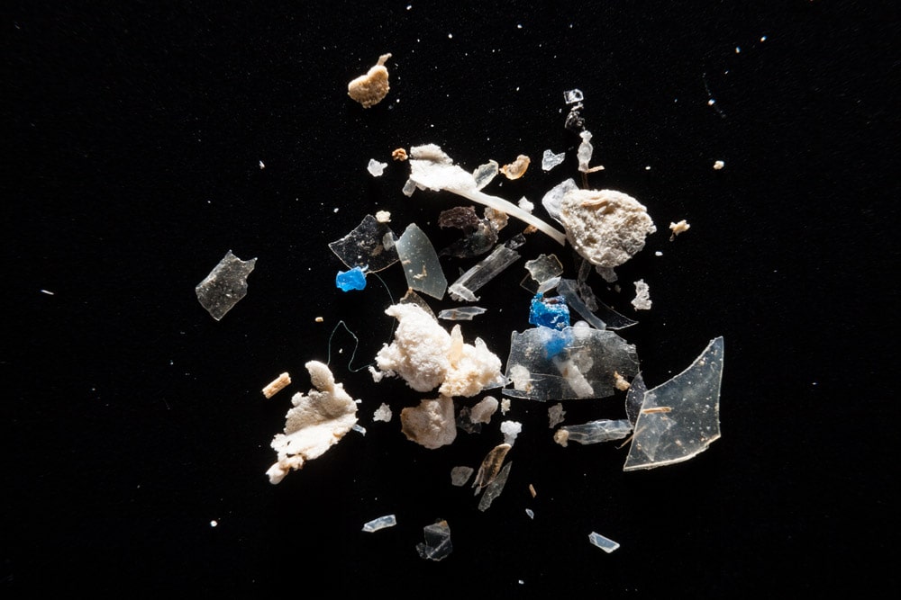 Pieces of plastic on water