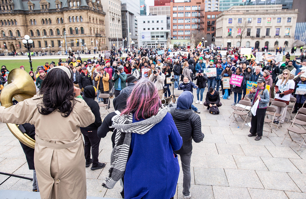 People are seen gathering in the March to End the Plastic Era 2024 held in Ottawa, Canada