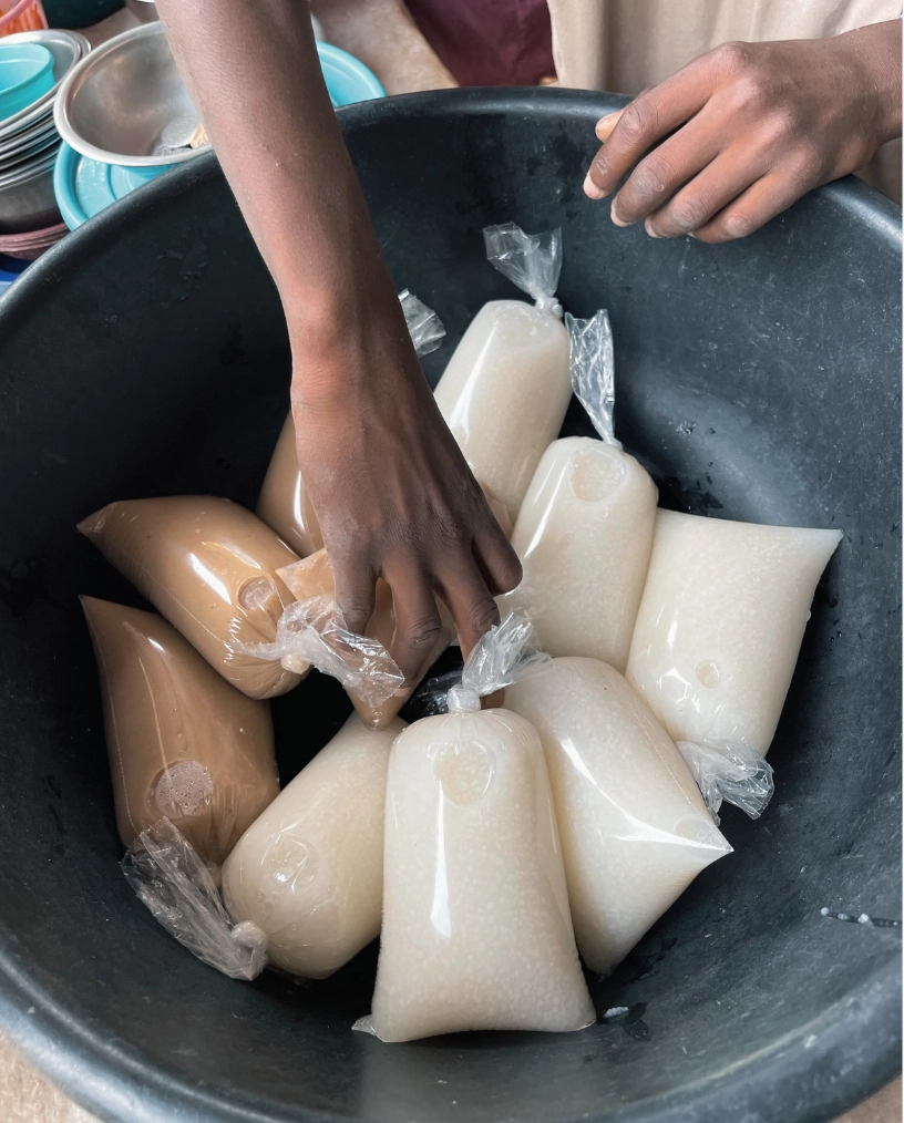 Several hot porridge wrapped in plastic in a big bowl